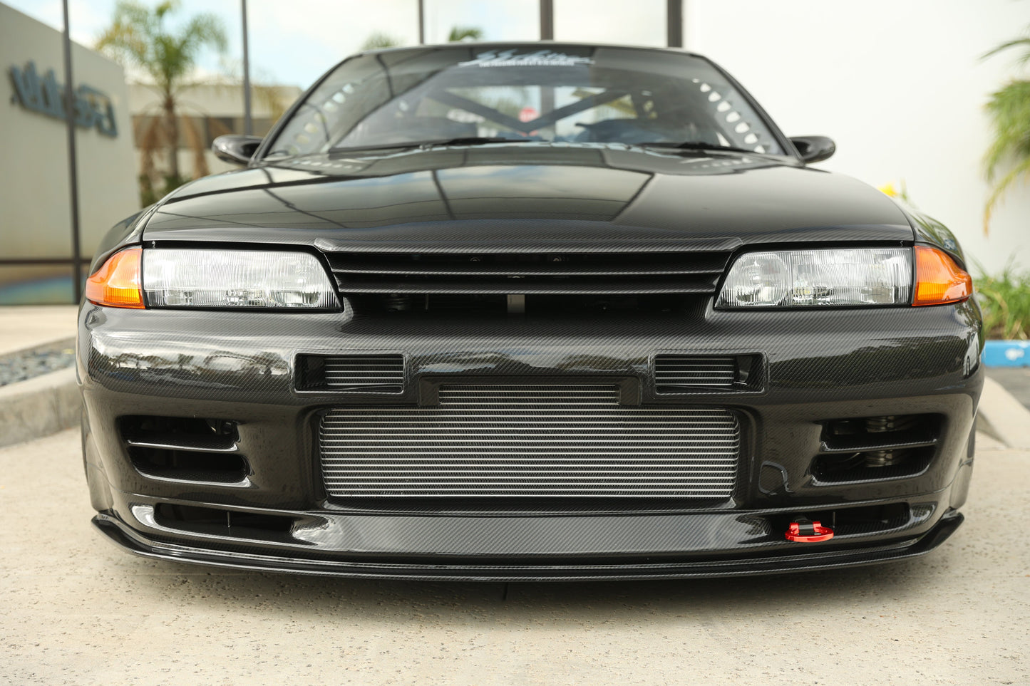GReddy 89-94 Nissan Skyline GT-R R32 Flip-Up Tow Hook - Front
